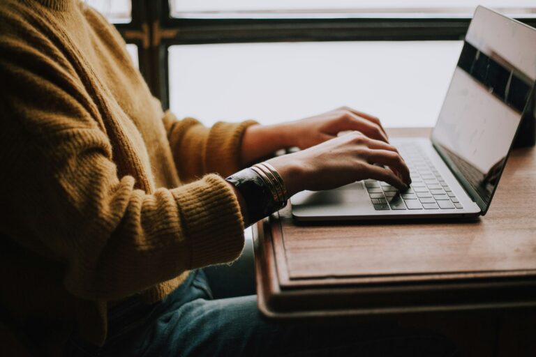 Person using laptop Photo by Christin Hume on Unsplash
